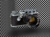 Leica IIIf, Germania Ovest, 1954. Pattern grafico ispirato agli abiti a corolla di Christian Dior. Ad esempio, i pois sono fotografati da Sabine Weiss in Mode pour Vogue, France, nel 1955